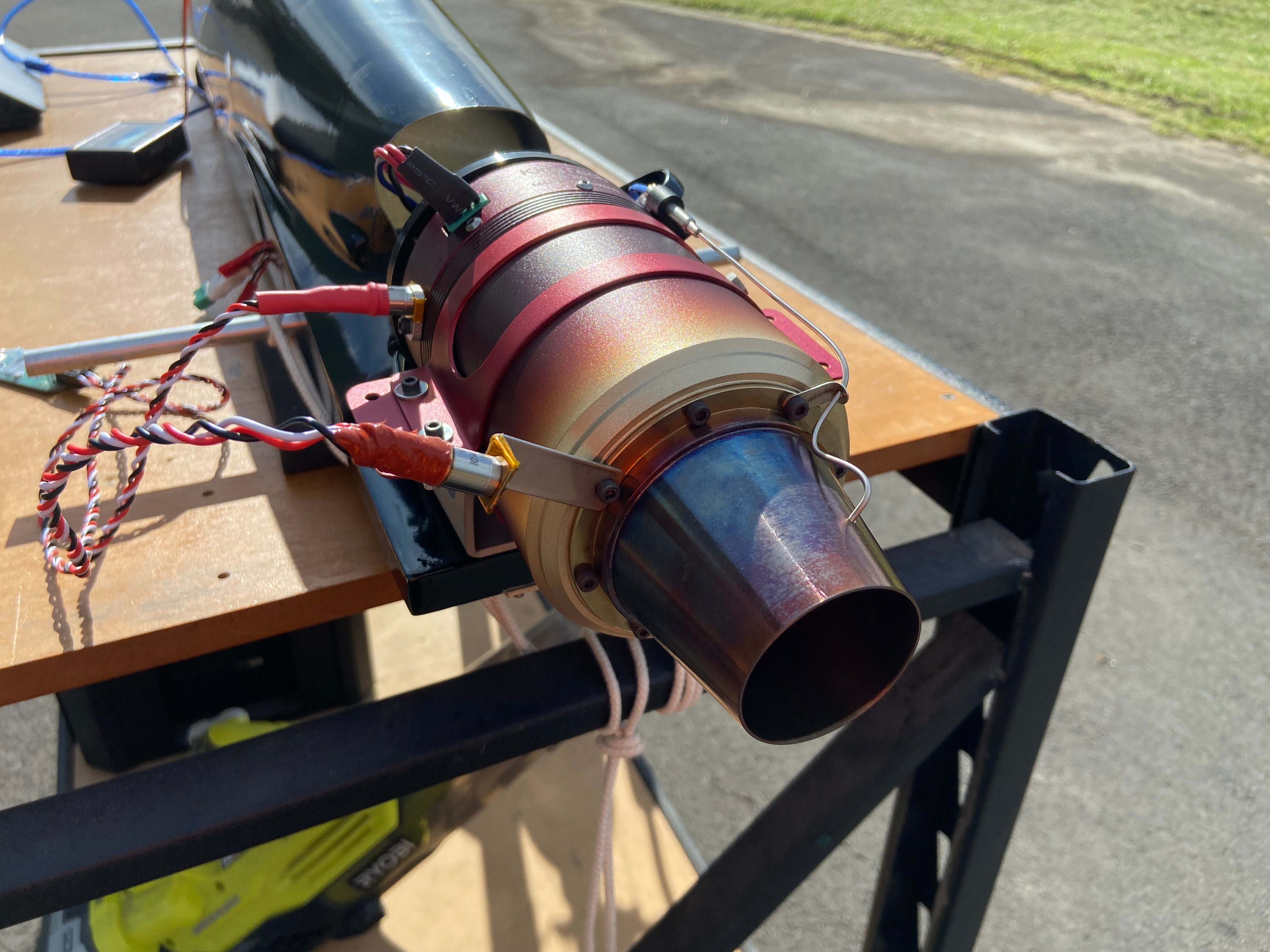 TurboScan system connected to a microturbine engine, displaying real-time vibration and fault detection data.